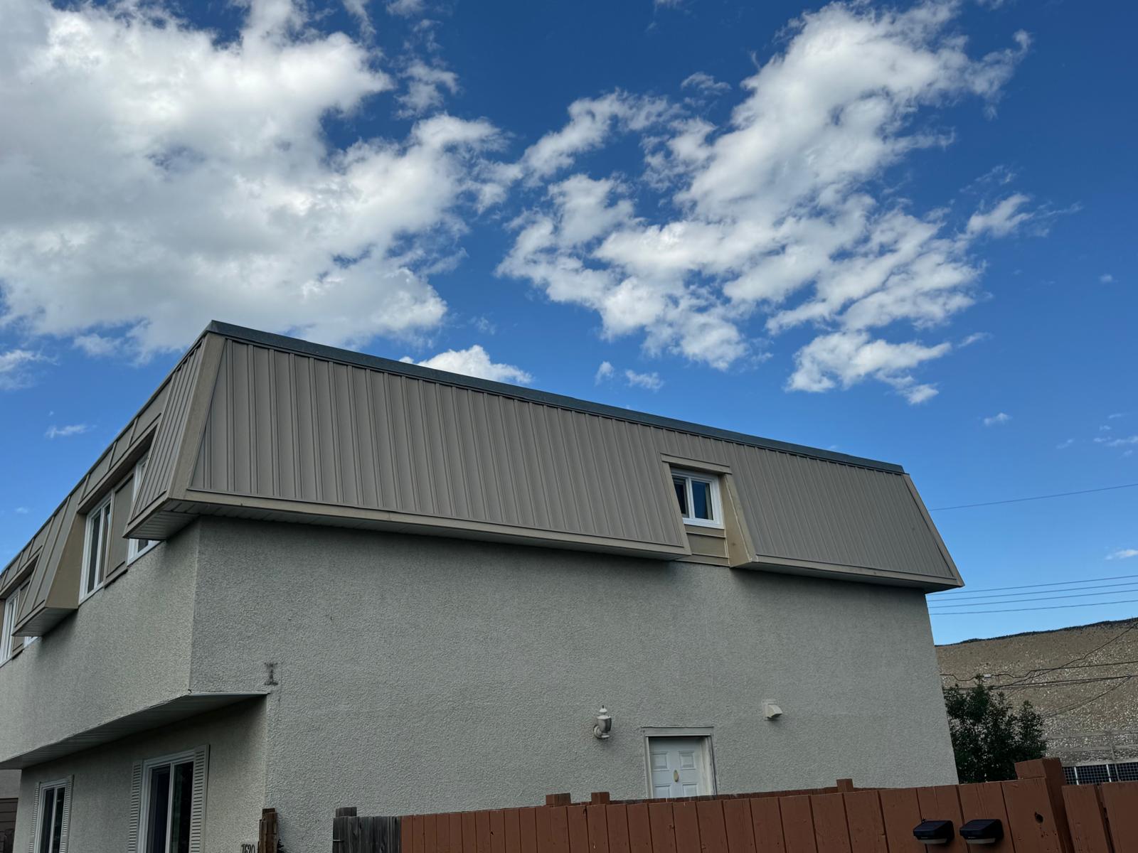 Close-up of James Hardie siding installation with perfect trim work in Calgary