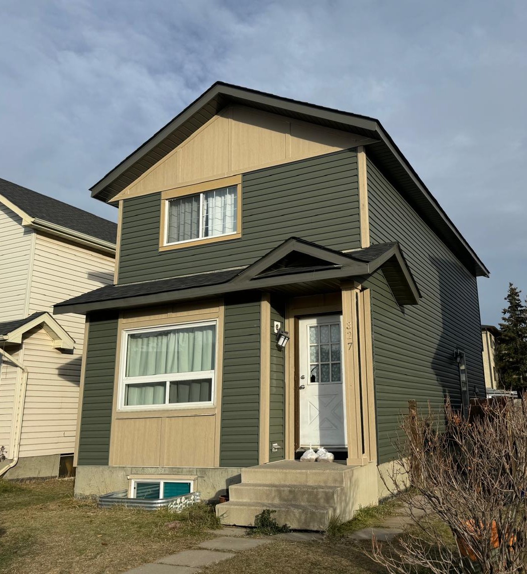 Beautiful modern home in Calgary with large windows and clean siding